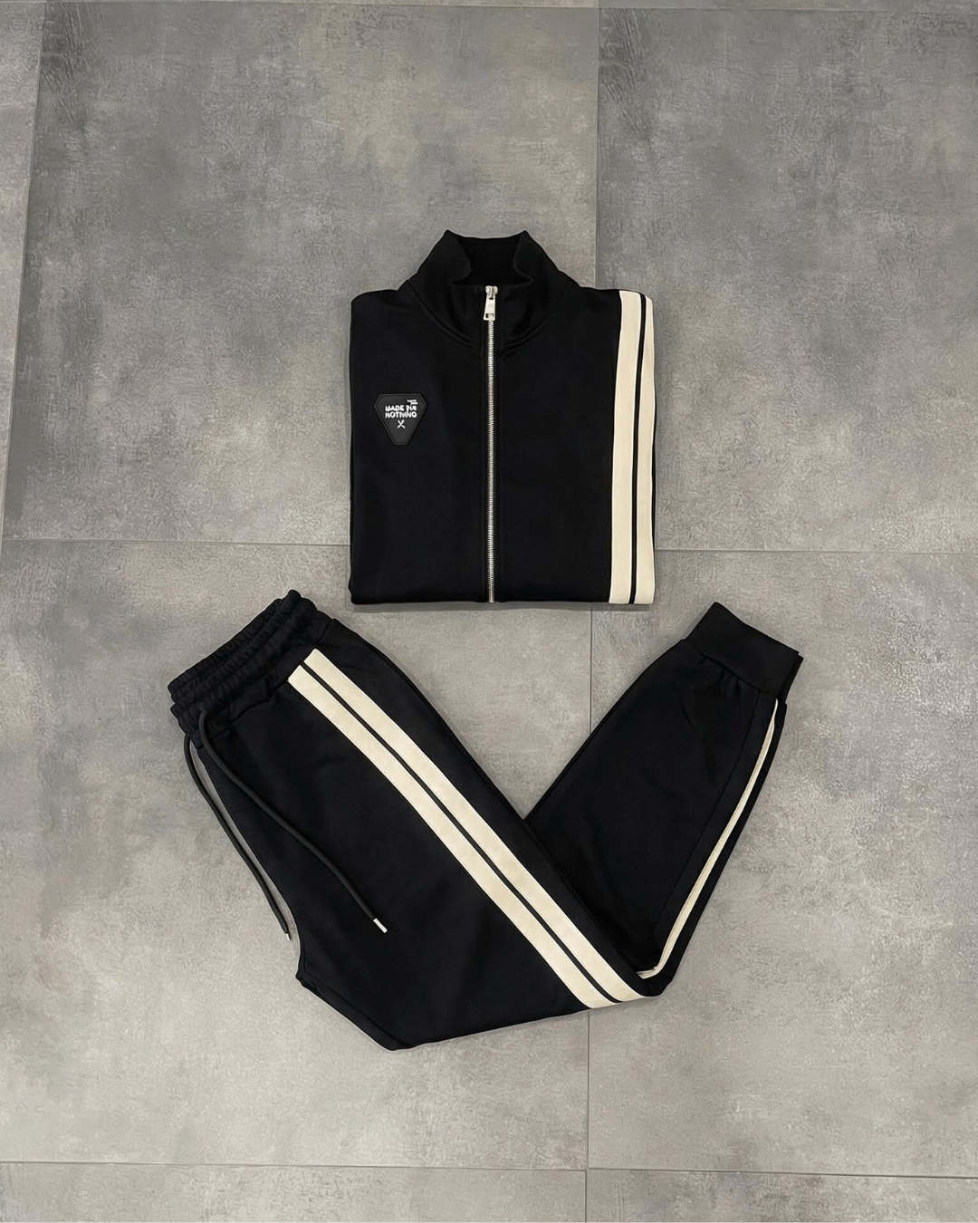 Traksuite dual strike